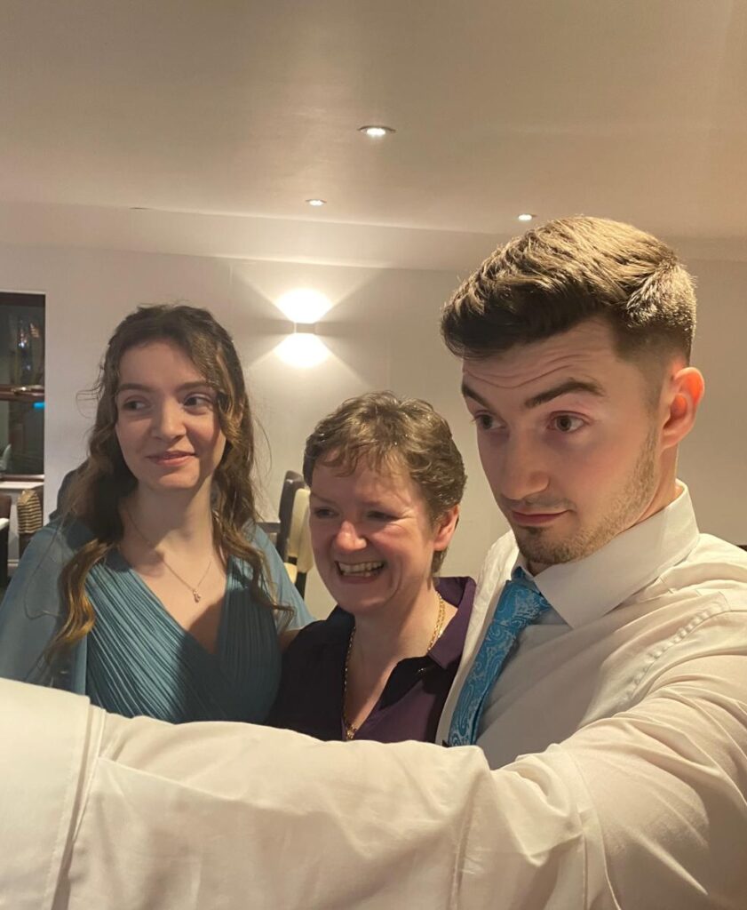 tamzin smiling with students